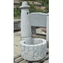 Fountain in granite column