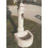 Fountain in granite column